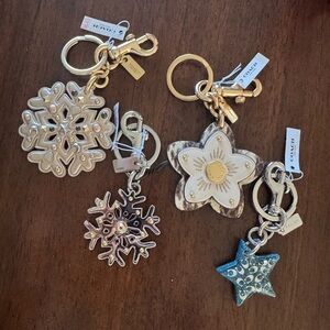 Coach Metallic Snowflake & Star Charm Keychain Set in Gold and Silver